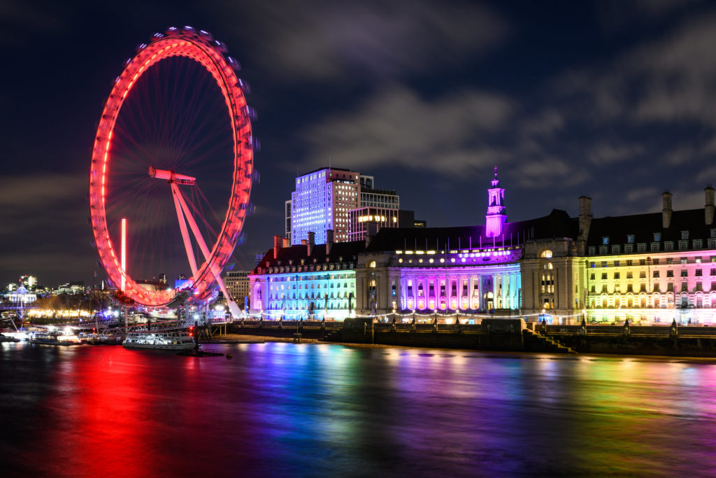 London Eye and County Hall illuminated in rainbow lights